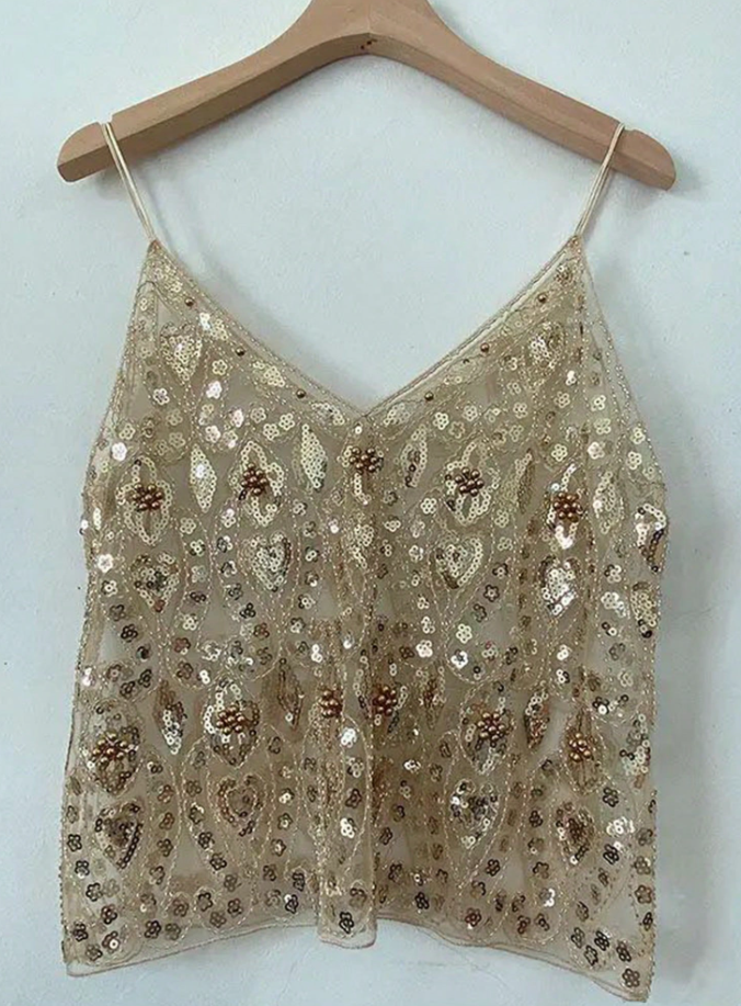 Diane udsmykket top